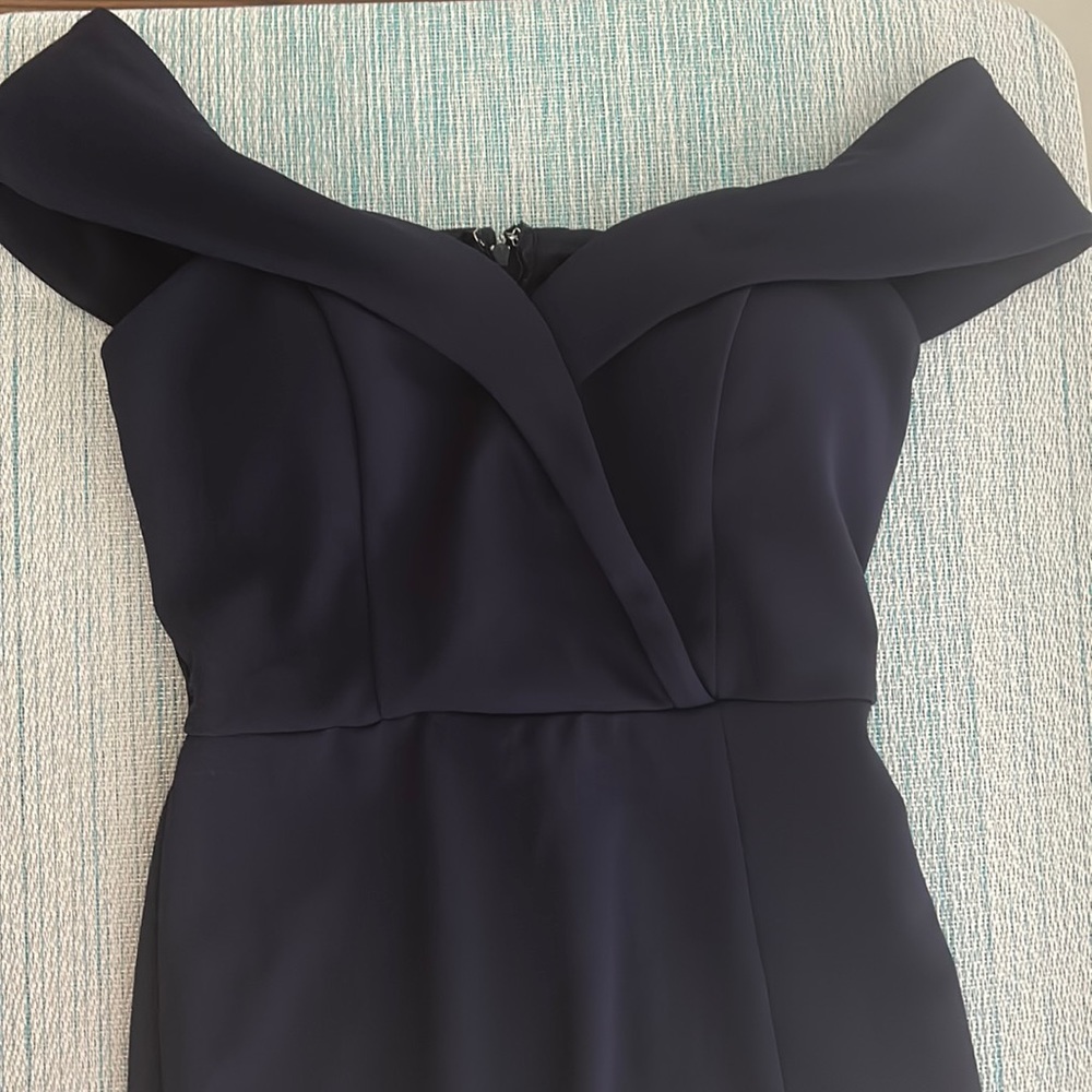 Navy blue cocktail dress mid thigh length.